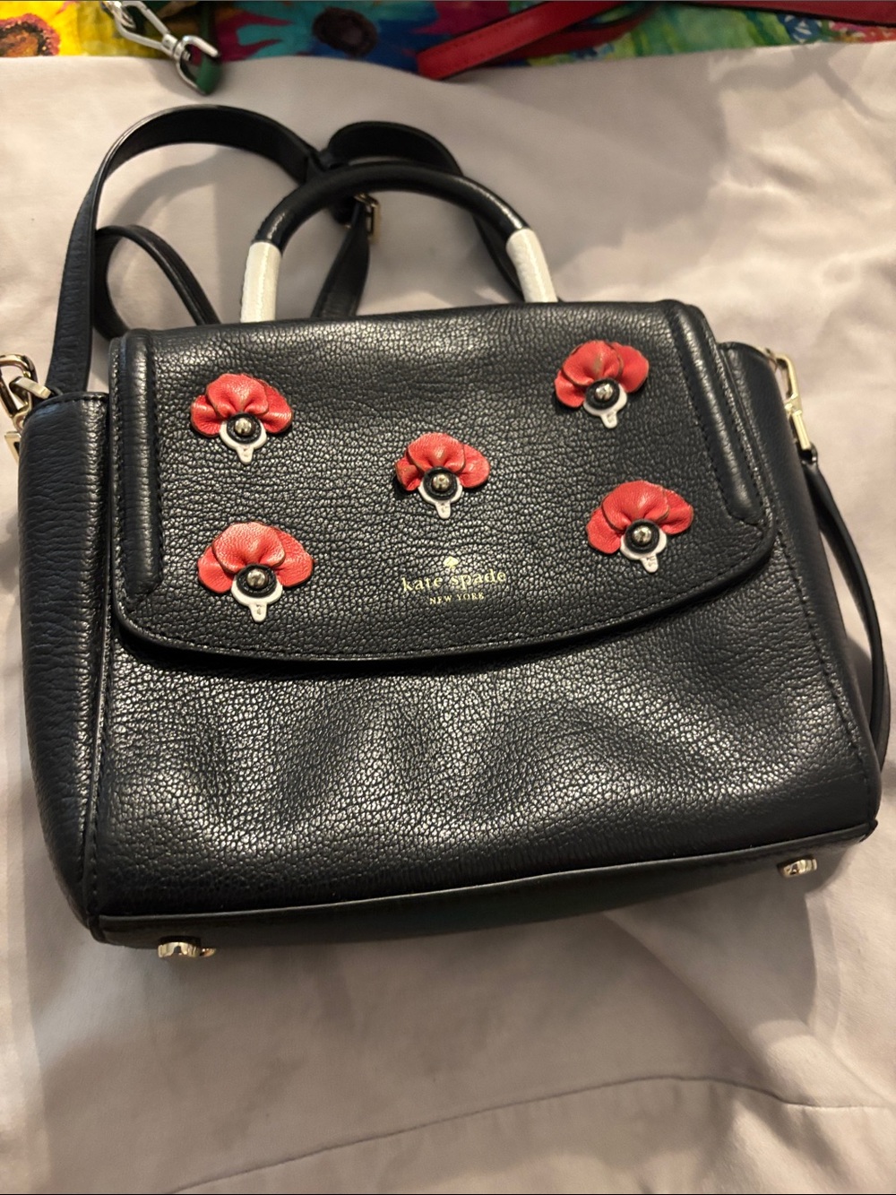 kate spade Black Leather Satchel with Red Floral Appliqués